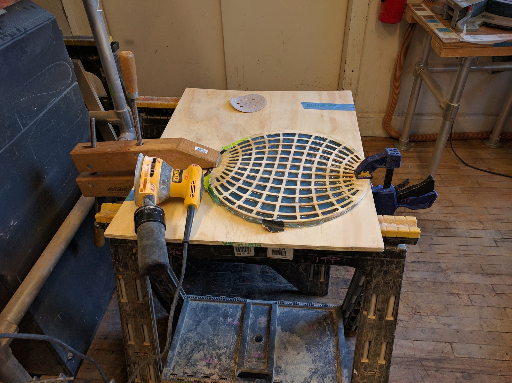 top of the table set up for sanding after the resin has dried.